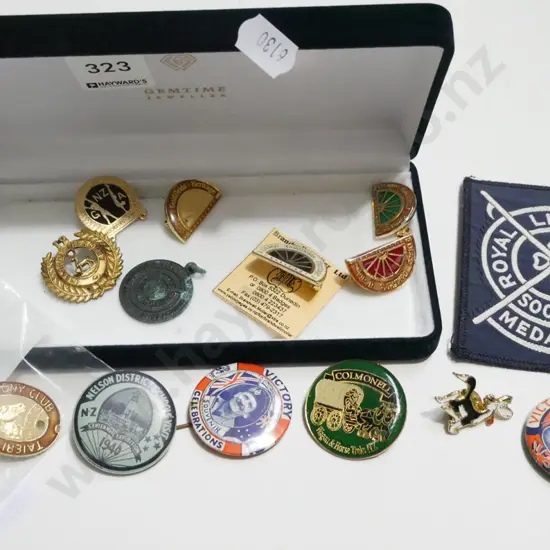 container of various badges