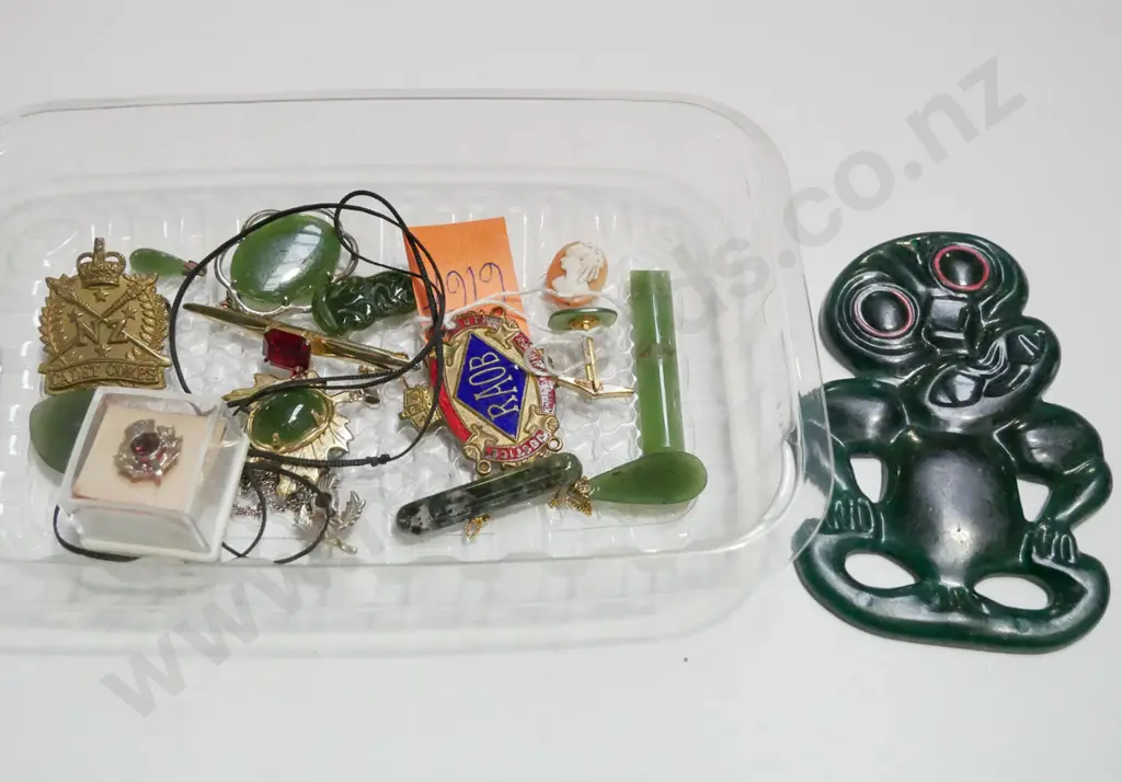 tray; plastic tiki, brooches, badges etc Image 1++
