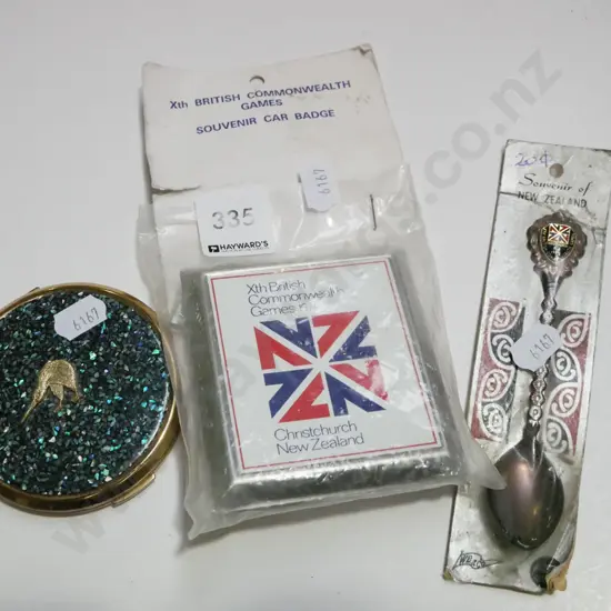Commonwealth car badge, powder compact etc