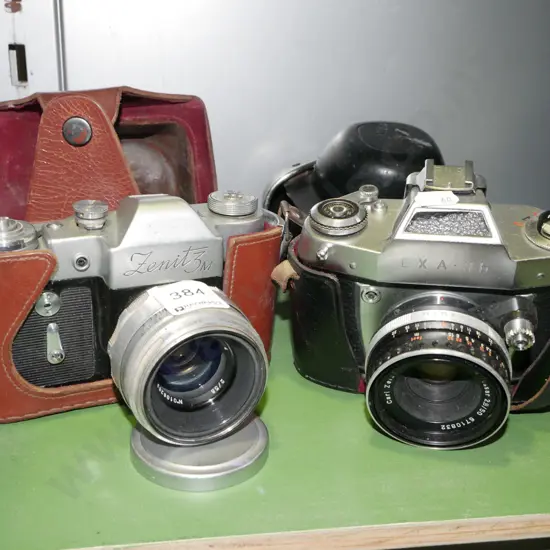 2x leather cased 35mm film cameras