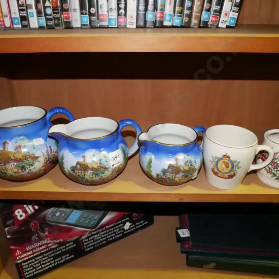 3x graduated English cottage jugs, lidded canister, coffee cup