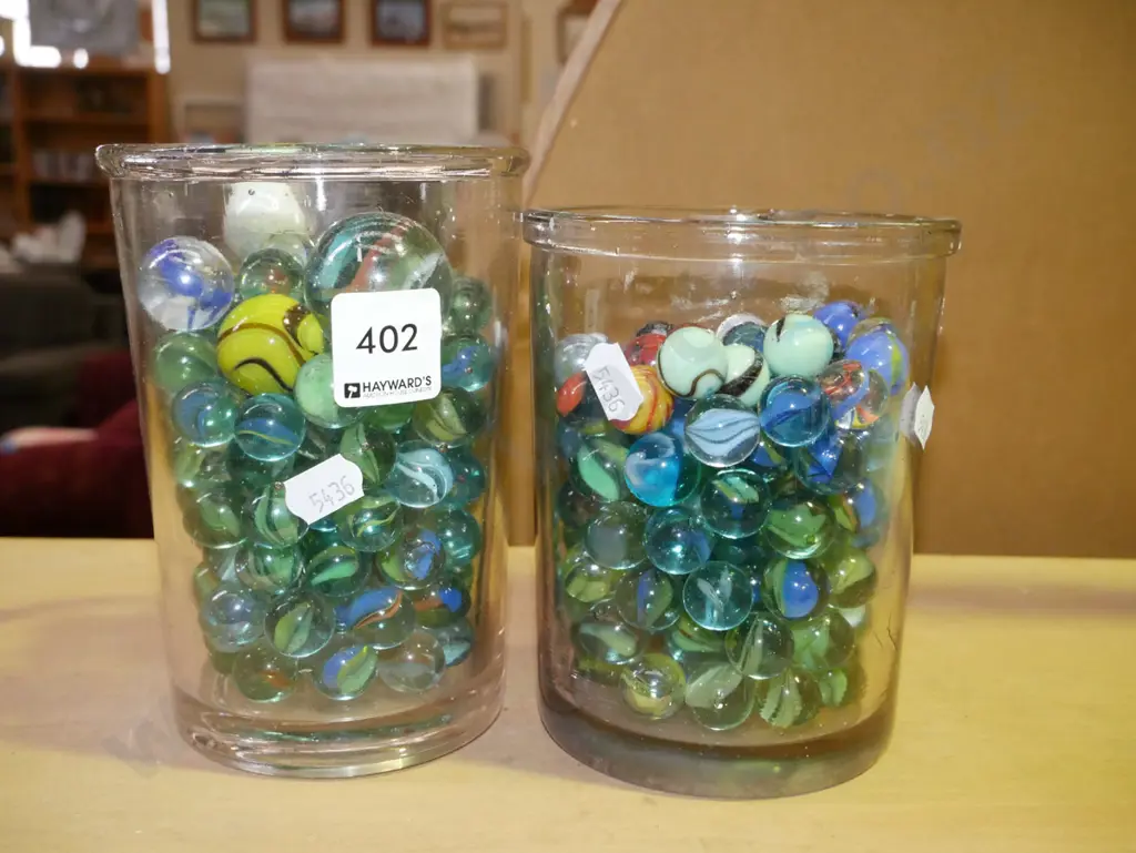 2x containers of marbles Image 1++