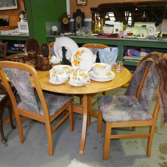 solid timber dining table and 4 matching upholstered chairs