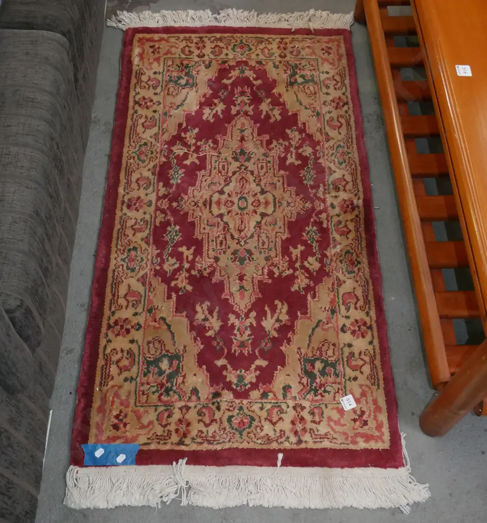 small floor mat - has a tear L-1160 W-610 Image 1++