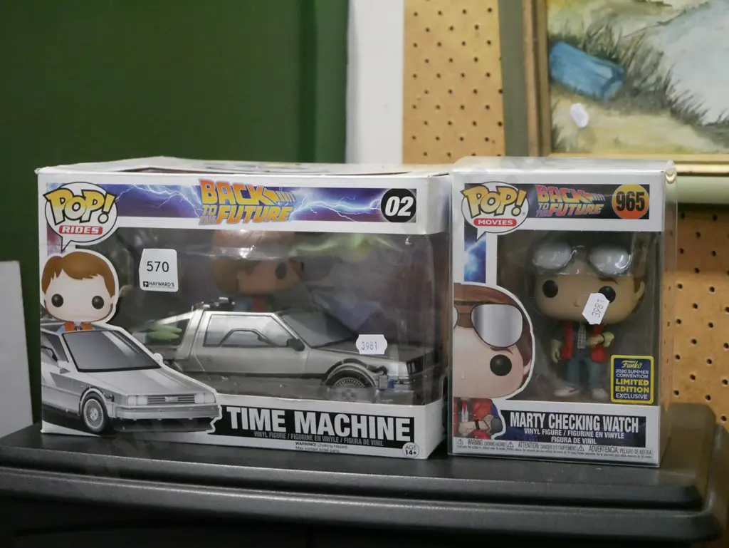 2 Pop movie figurines - Back to the Future Delorean, Marty Checking Watch Image 1++
