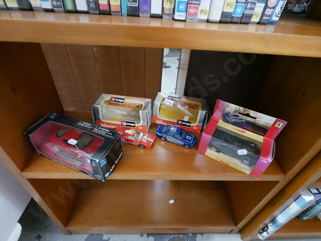 shelf of model vehicles Image 1++