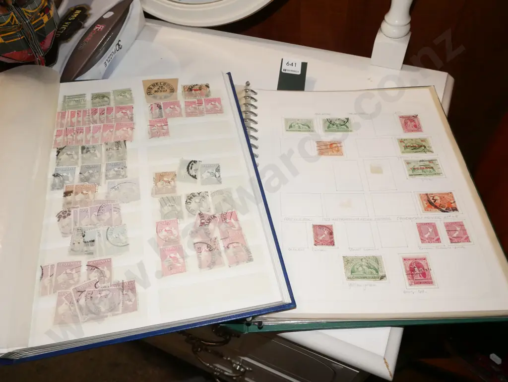 2x stamp albums Image 1++
