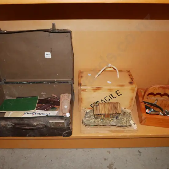 shelf; vintage suitcase, leather wrist straps, hand made stone cottage, basket etc