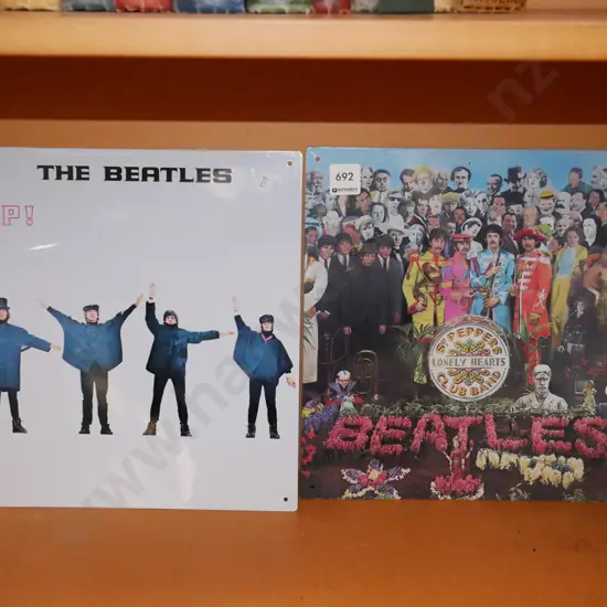 2 Beatles record cover prints on tin