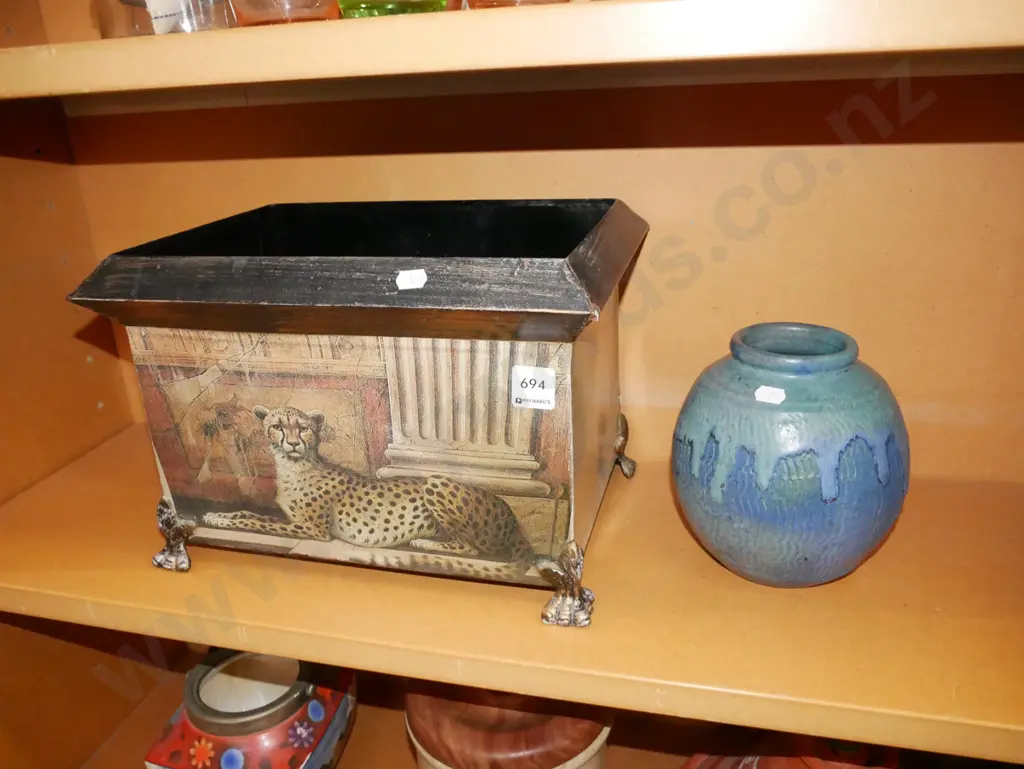 footed tin bin with leopard print, small pottery vase Image 1++