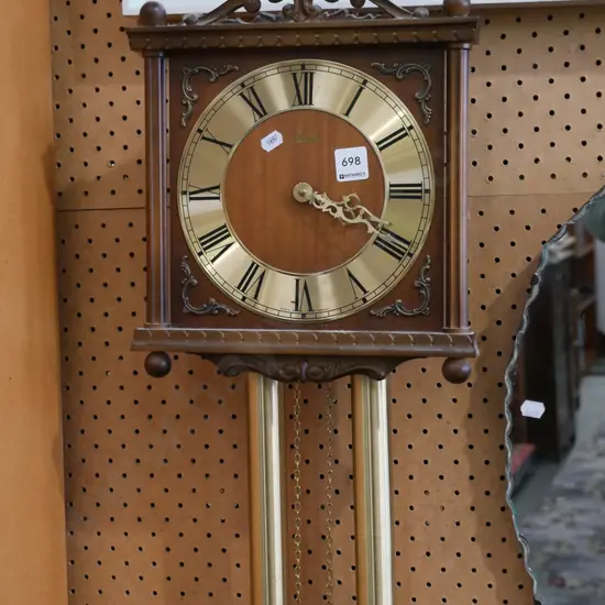 pendulum wall clock - needs attention