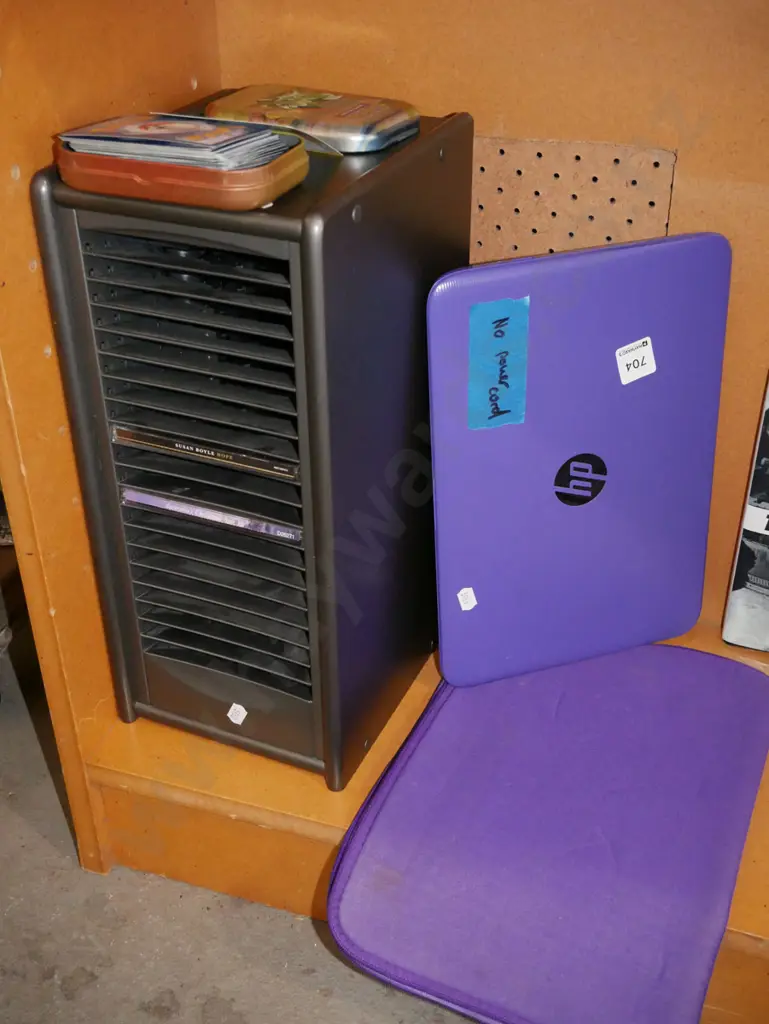 CD tower, tin of Pokemon cards, HP Notebook - no cord Image 1++