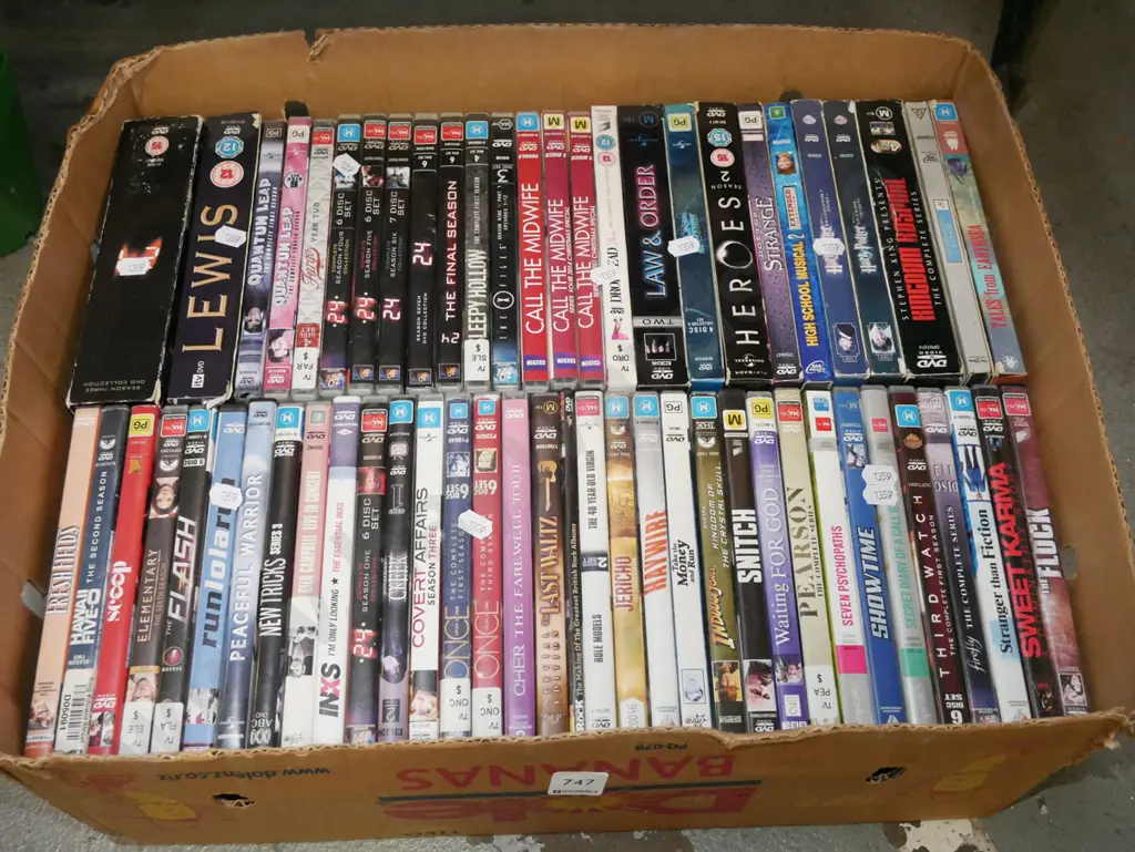 box of DVDs Image 1++