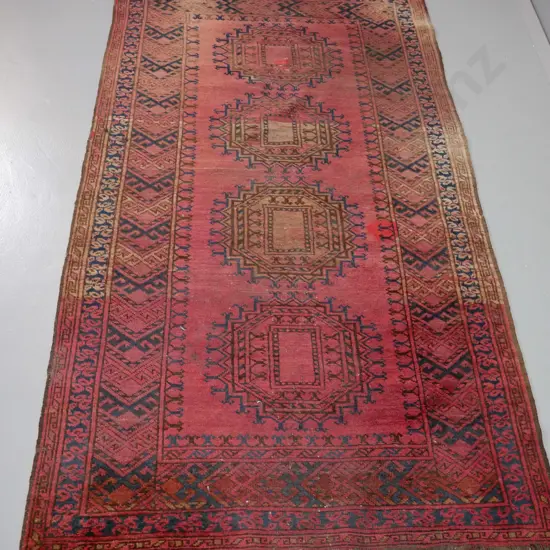 Persian style hand woven floor rug - dark reds, browns, black - fading and a repair/patch L-2190 W-1200