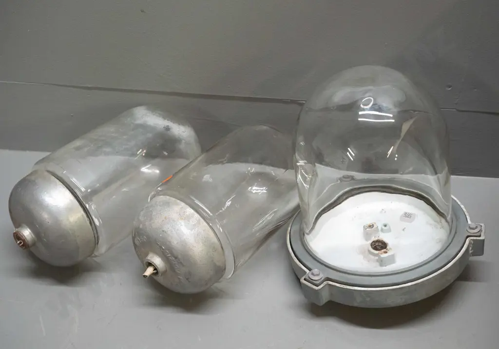 3 industrial or ship's light fittings with heavy cast metal housing and glass dome shades, pair of smaller ones Image 1++
