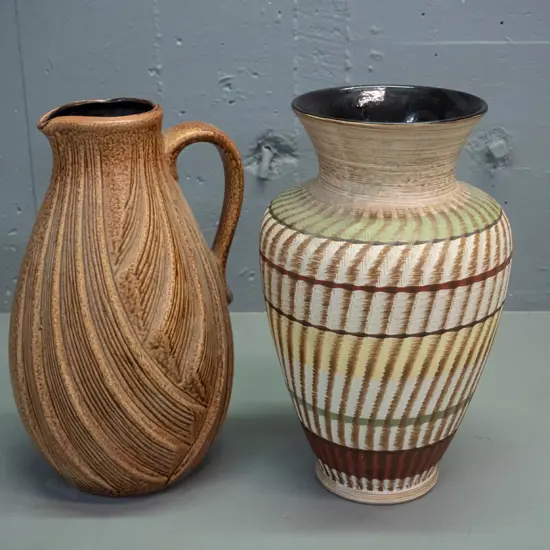 2 large German pottery vases - both black inside, woven grass motif handled jug vase, other sgraffito design H-310 D-190