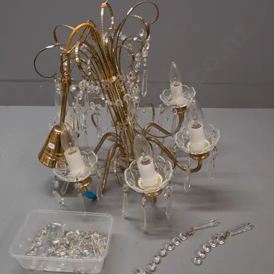 Handmade 6-light brass and crystal chandelier, made in Prague circa 1990,l with some spare