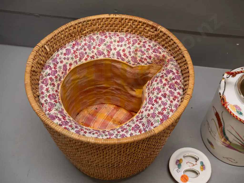 Chinese teapot in fitted & insulated cane & fabric holder, wire and woven fabric handles have some fraying, chip to rim Image 1++