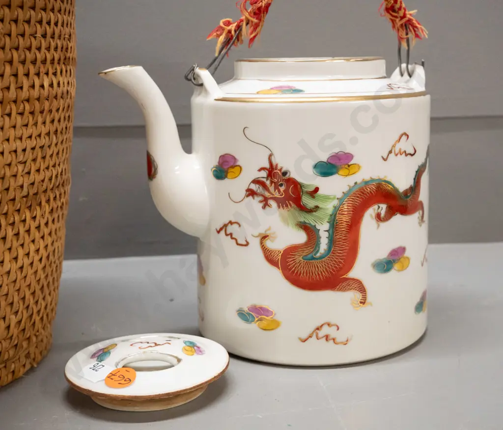 Chinese teapot in fitted & insulated cane & fabric holder, wire and woven fabric handles have some fraying, chip to rim Image 1++