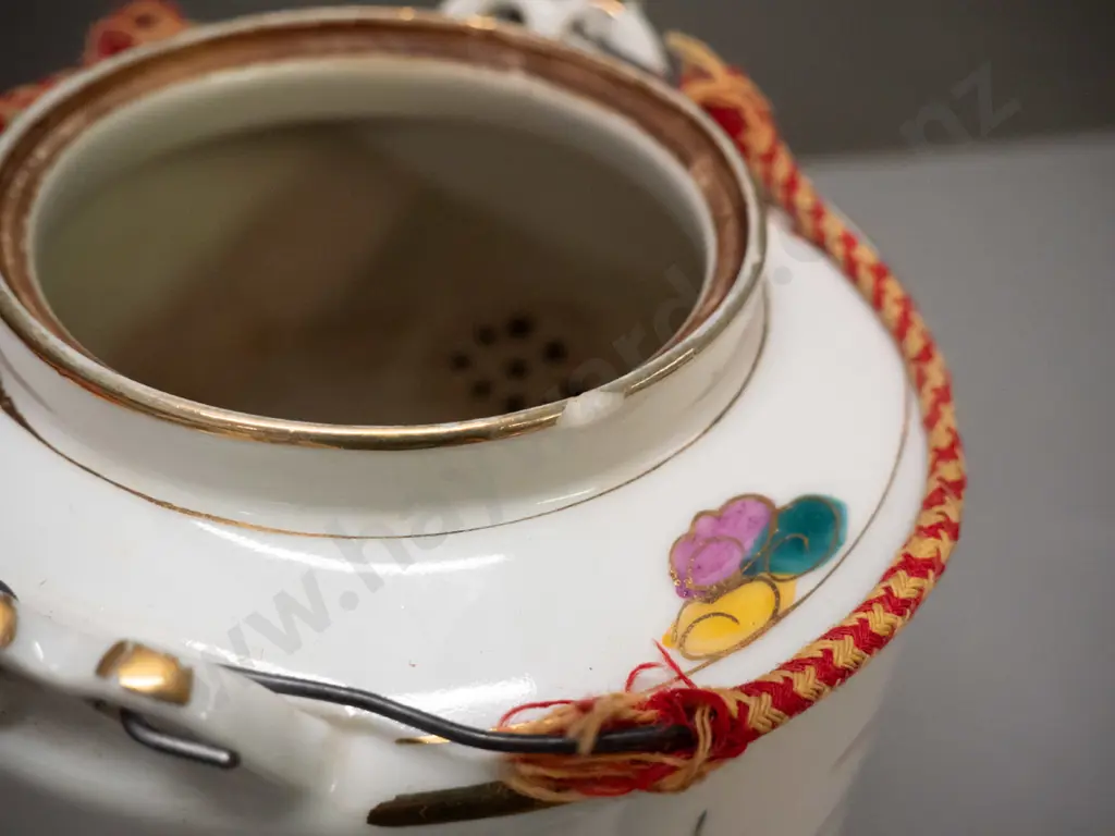 Chinese teapot in fitted & insulated cane & fabric holder, wire and woven fabric handles have some fraying, chip to rim Image 1++