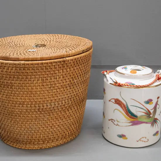 Chinese teapot in fitted & insulated cane & fabric holder, wire and woven fabric handles have some fraying, chip to rim