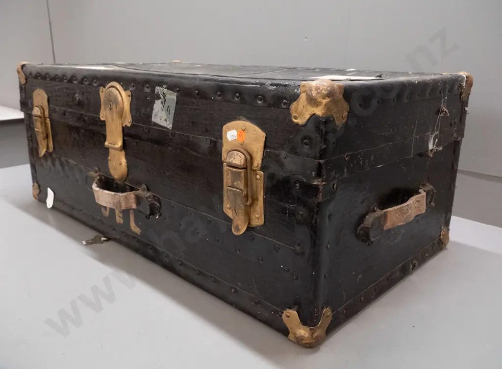 large vintage travel trunk - metal bound board & fibre, painted black and gilt painted latches, missing shelf and one Image 1++