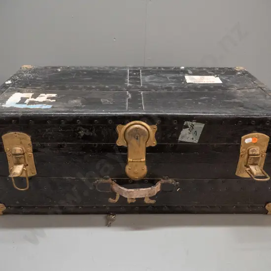 large vintage travel trunk - metal bound board & fibre, painted black and gilt painted latches, missing shelf and one
