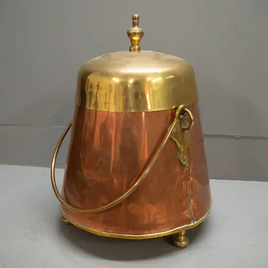 copper and brass conical shaped coal scuttle or storage vessel with cast brass handle and feet, brass knob H390 D-280 at