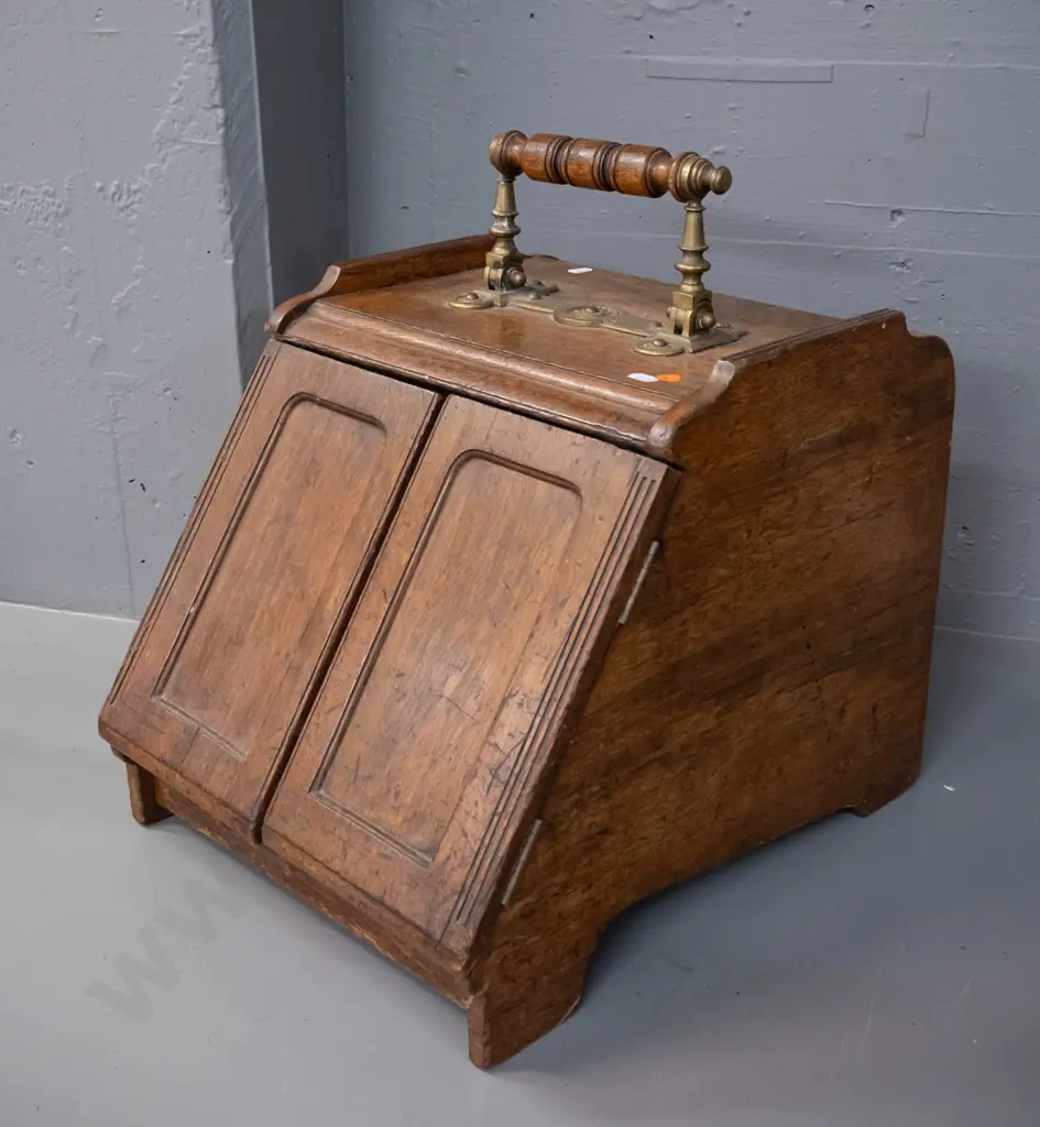 vintage oak coal scuttle with brass door-opening mechanism connected to brass and timber top handle, with tin liner. Image 1++