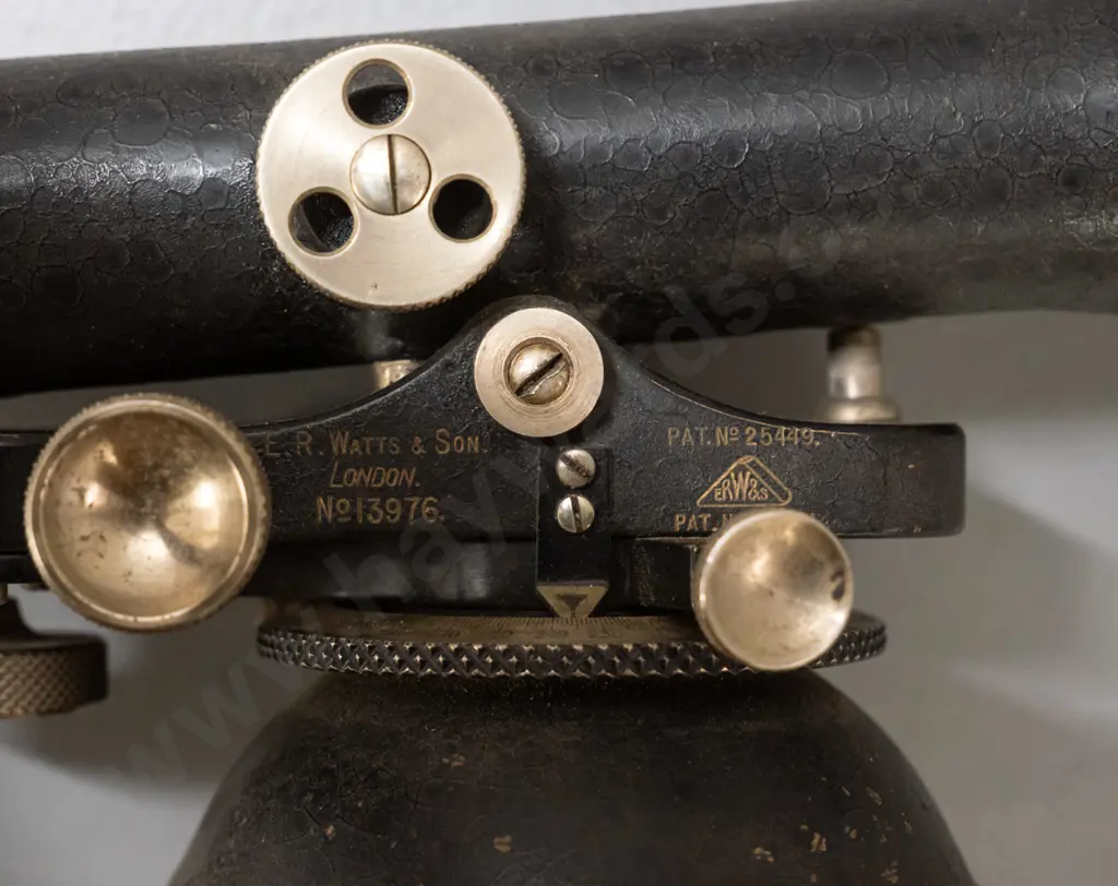 vintage surveyor's theodolite with wooden tripod, padded leather case, marked ER Watts London / Hugh & GK Neill Dunedin. Image 1++