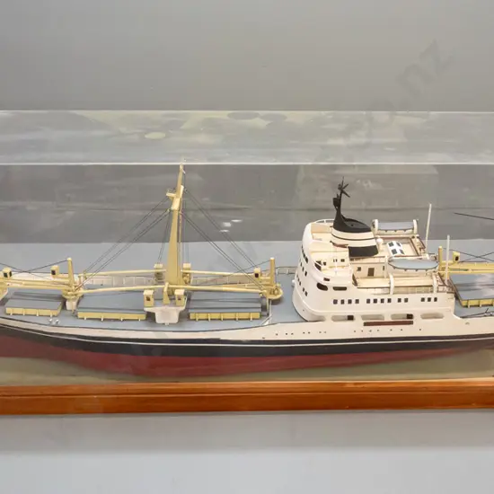 large motorised model cargo ship "Bulimba" in large timber and perspex display case, with remote control. Borer in case,