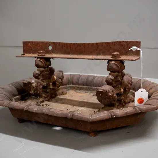 heavy cast iron boot scraper with fish motif supports - corrosion and a split to casting on edge, replacement scraper