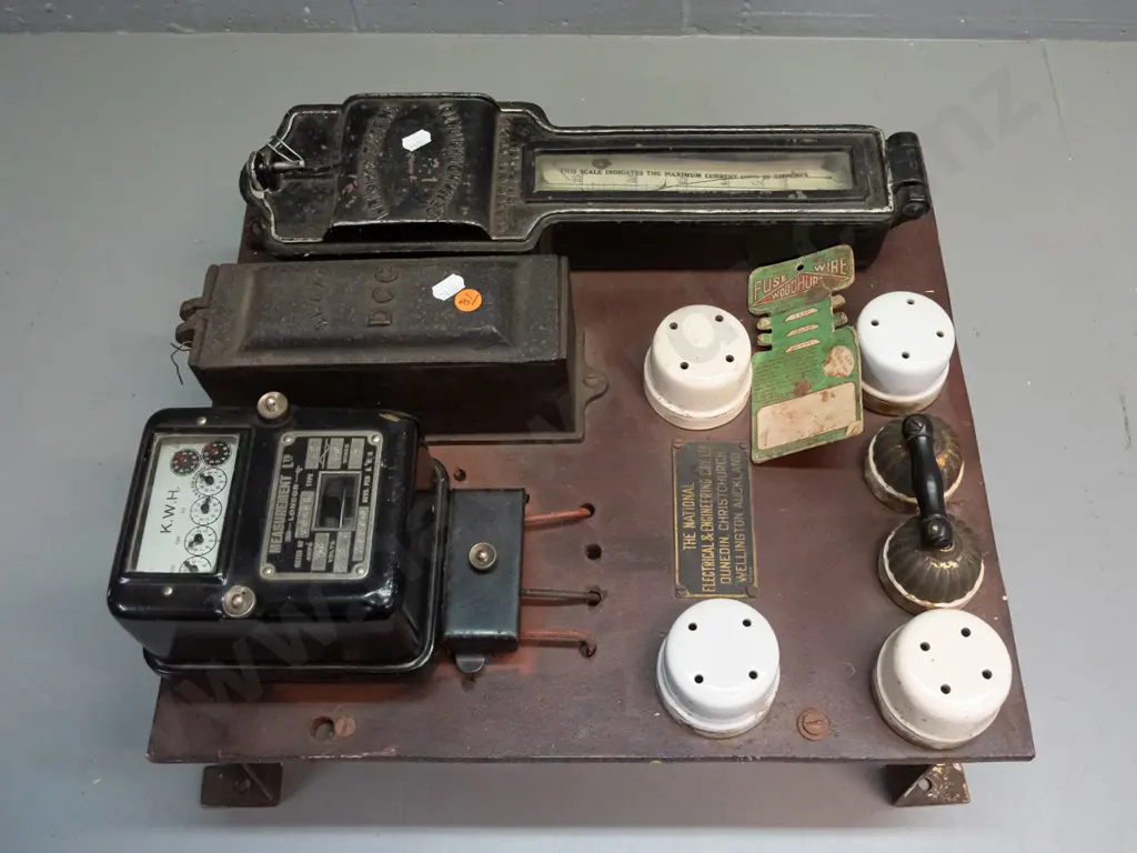 vintage electric meter board with assorted meters, fuses etc and a small fuse wire card - glass window on one meter is Image 1++