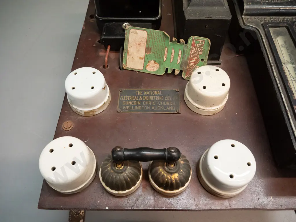 vintage electric meter board with assorted meters, fuses etc and a small fuse wire card - glass window on one meter is Image 1++