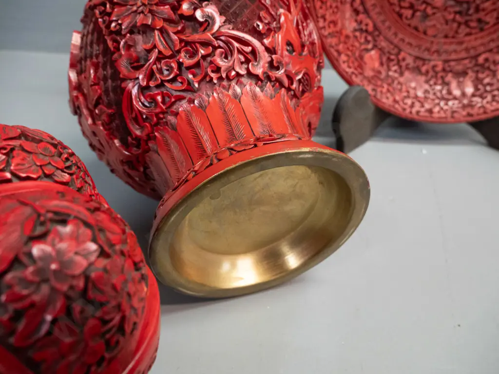 3 cinnabar style composite items - vase, plate with stand, and gourd shaped lidded container on pierced wooden stand. Image 1++