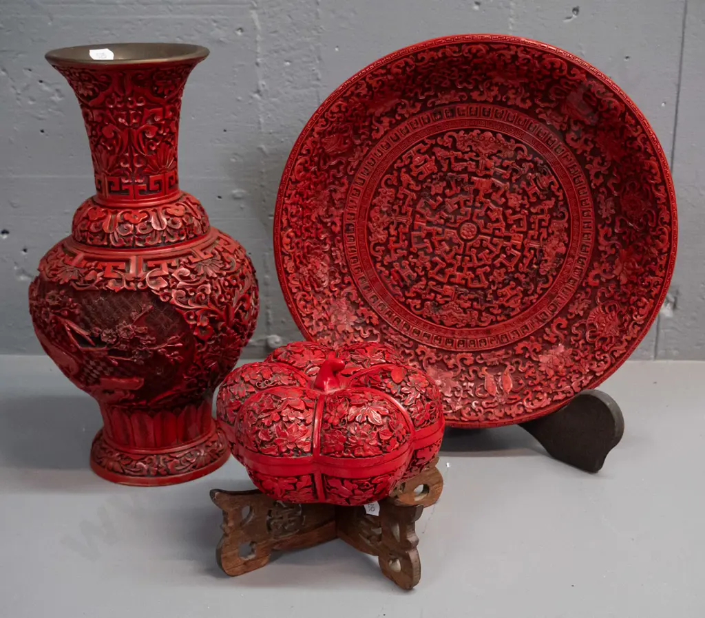 3 cinnabar style composite items - vase, plate with stand, and gourd shaped lidded container on pierced wooden stand. Image 1++