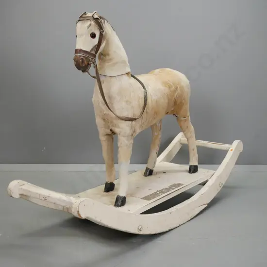 vintage rocking horse with hide covered timber horse w/brass eyes, timber hooves and nose, wear to mane, ears, tail,