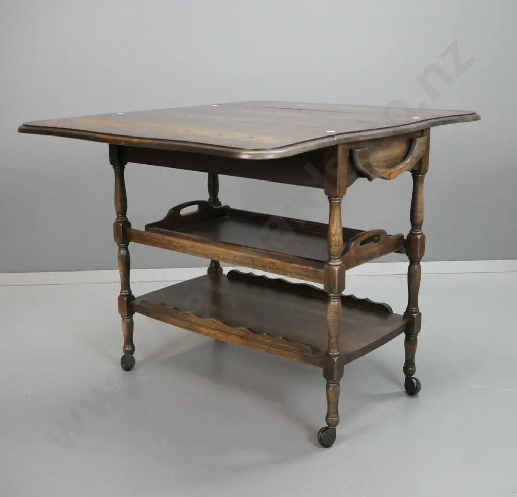 vintage oak drop-side tea trolley with shaped edge, single drawer, slide in serving tray and bottom shelf with shaped Image 1++