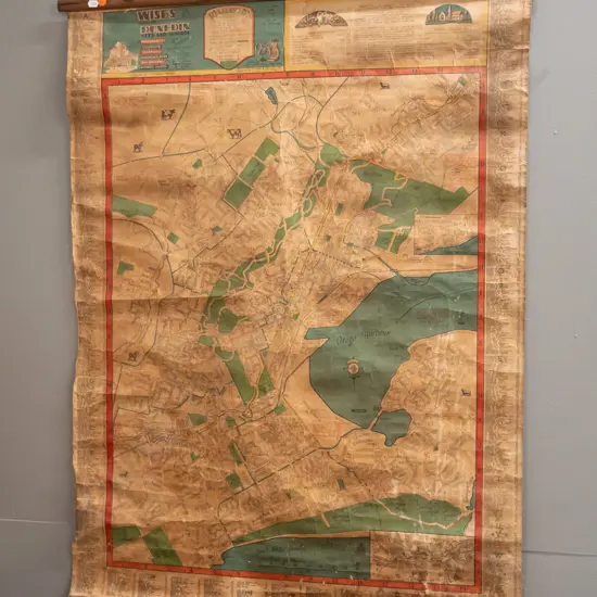 vintage Wise's Dunedin wall map on timber hangers - age wear, creases and discolouration. H-1030 W-770