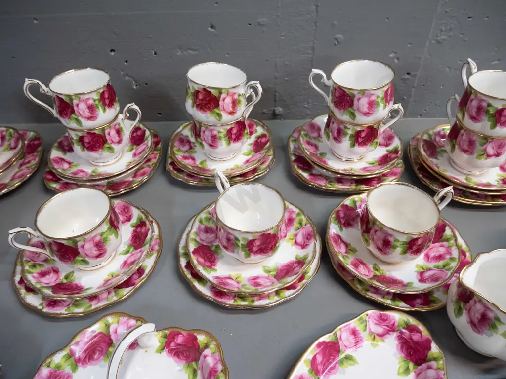 large quantity of Royal Albert Old English Rose teaware - 15 trios, cream, sugar, 4 small dishes, spare saucer & plate Image 1++