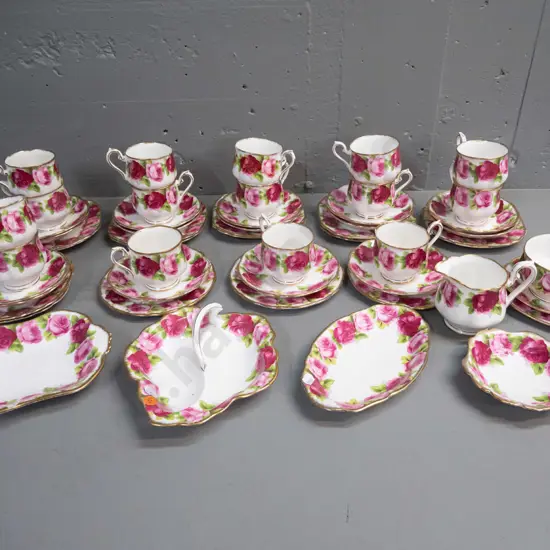 large quantity of Royal Albert Old English Rose teaware - 15 trios, cream, sugar, 4 small dishes, spare saucer & plate