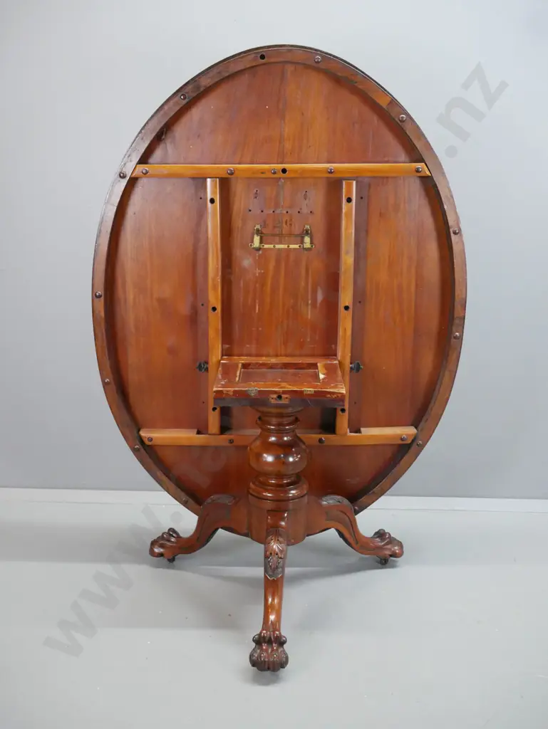 Victorian walnut tilt-top loo table with boxwood stringing & inlay decoration, 3 point pedestal base with carved knees Image 1++