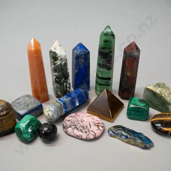 assorted semi-precious stone and mineral specimens - some polished, some obelisk shaped, tallest is H-105