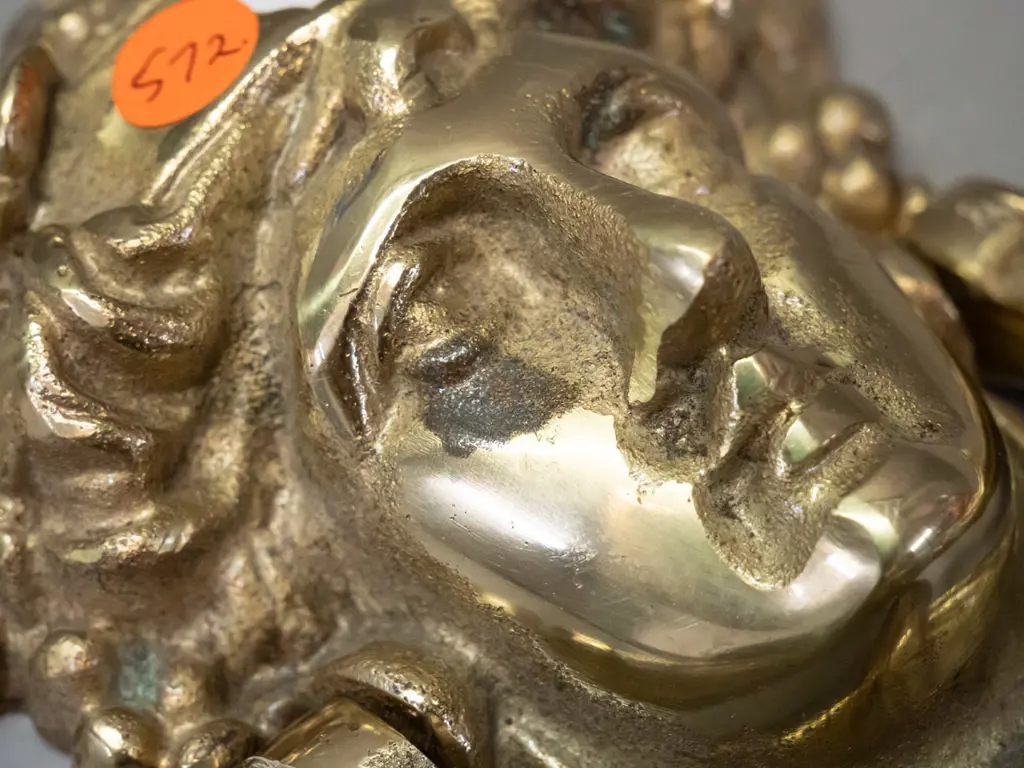 cast brass figural door knocker with Romanesque face - some pitting and discolouration. H-170 W-120 Image 1++