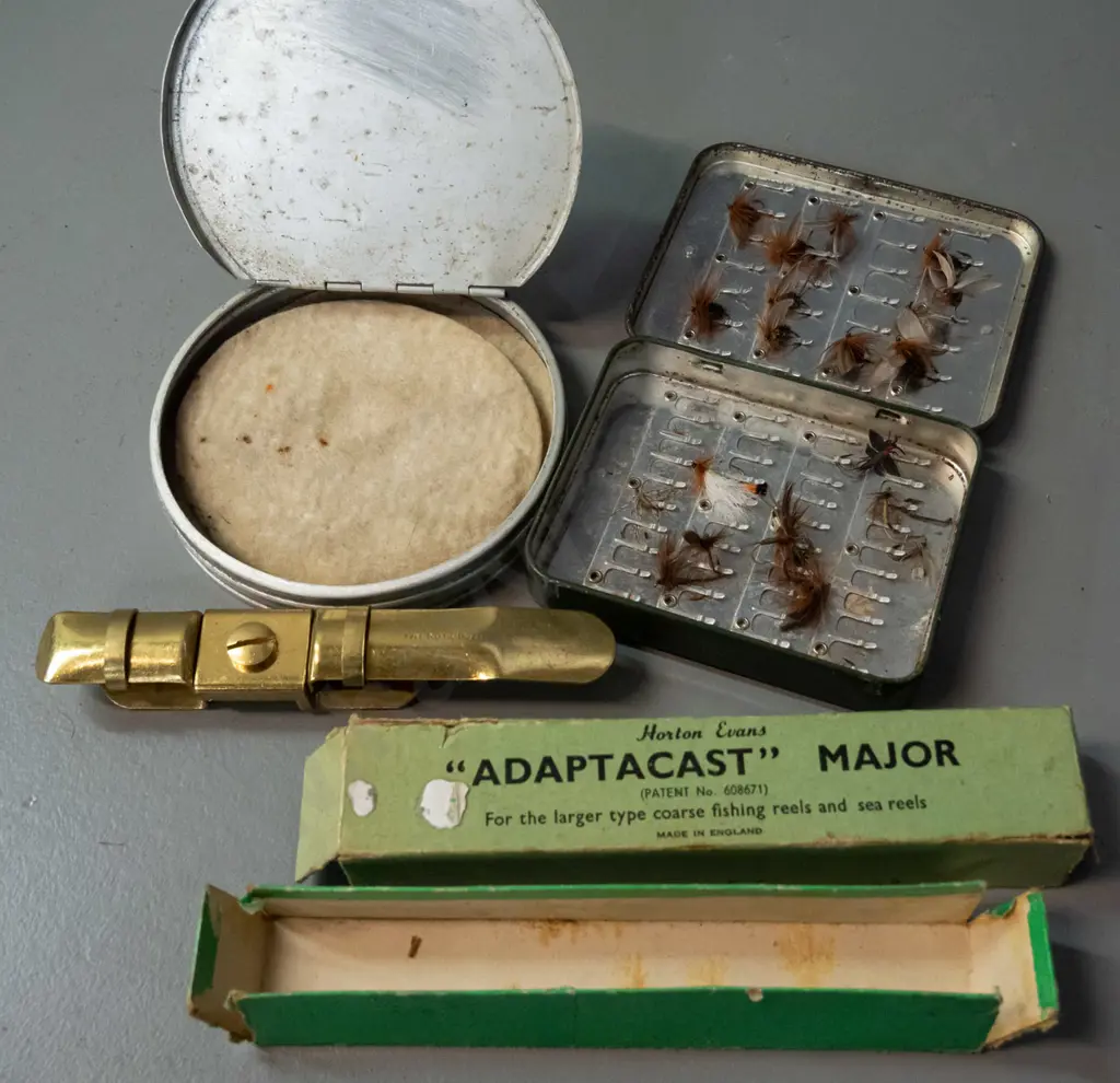 vintage fly fishing items - metal fly tins, one with contents, DAM Fish-o-mat combination scale / measuring tape, small Image 1++