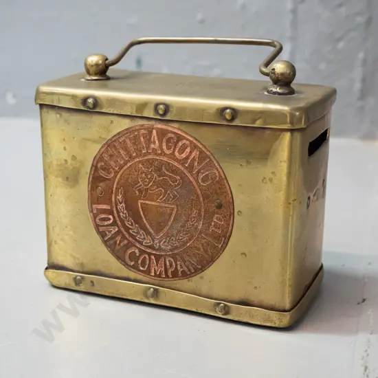 small Indian brass money box - medallion stamped Chittagong Loan Company / No. 6 - H-80 W-105 D-50