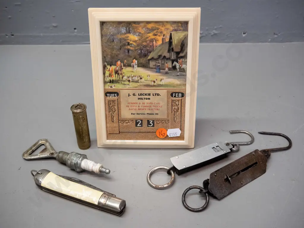 JG Leckie Ltd Milton framed perpetual calendar, spark plug bottle opener, pocket knife with saw blade, marked Richards Image 1++