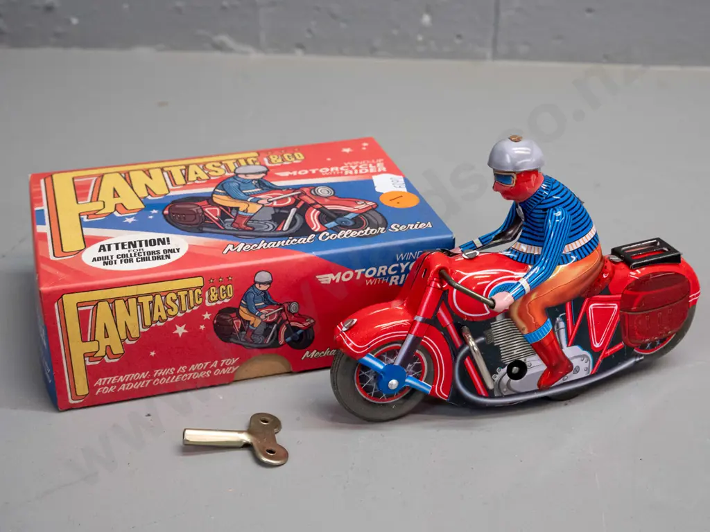 reproduction wind-up tin toy motorbike & rider, with box and key. Motorbike is L-130 Image 1++