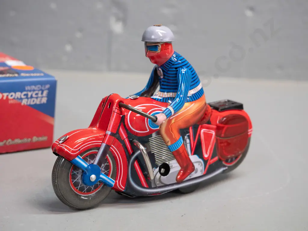 reproduction wind-up tin toy motorbike & rider, with box and key. Motorbike is L-130 Image 1++