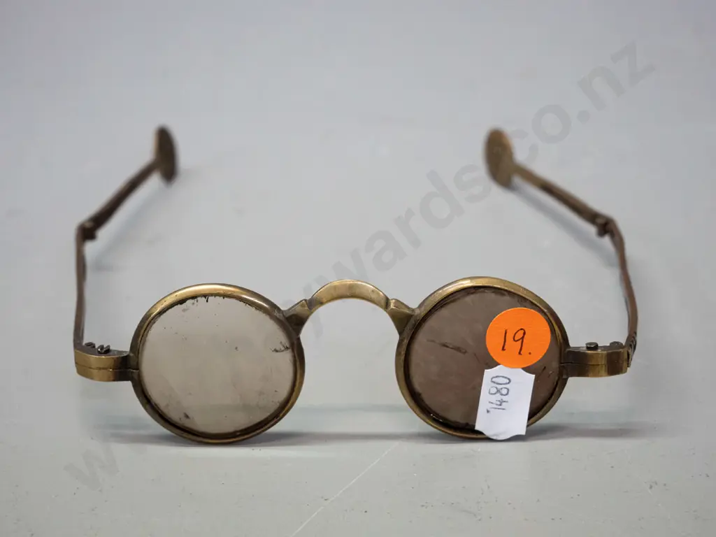 unusual folding brass framed eyeglasses  - slight chipping to lenses. W-120 folded. Image 1++
